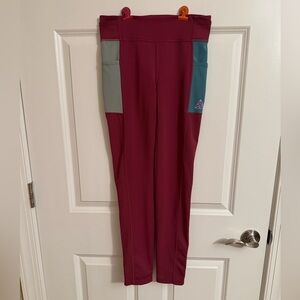 Girls XL Nike ACG Dri-FIT One leggings in a pink/magenta and blue colorway.